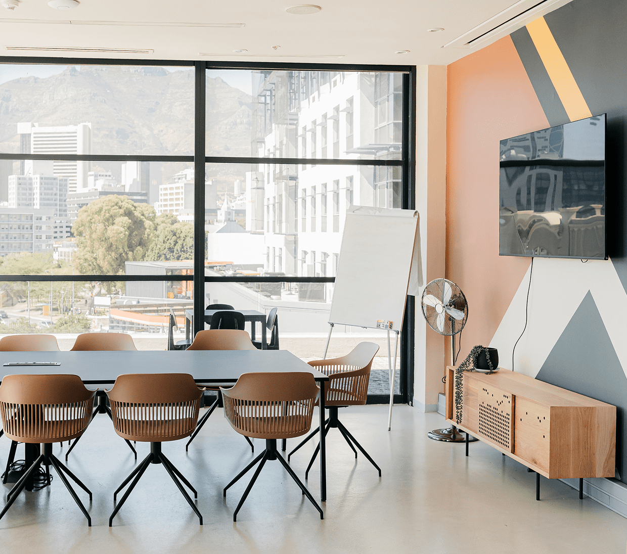 Modern conference room with city view.
